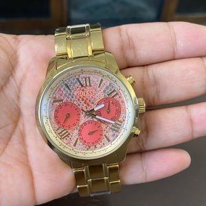 Gold women’s guess watch